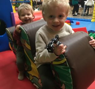 Jack smiling in a soft play area