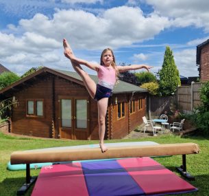 Madeleine doing her gymnastics